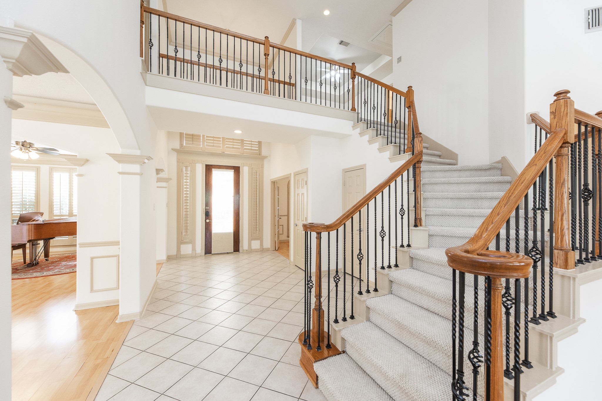 17826 Island Spring Lane Tomball, TX 77377 - Photo 15 of 47 a view of entryway and hall with wooden floor