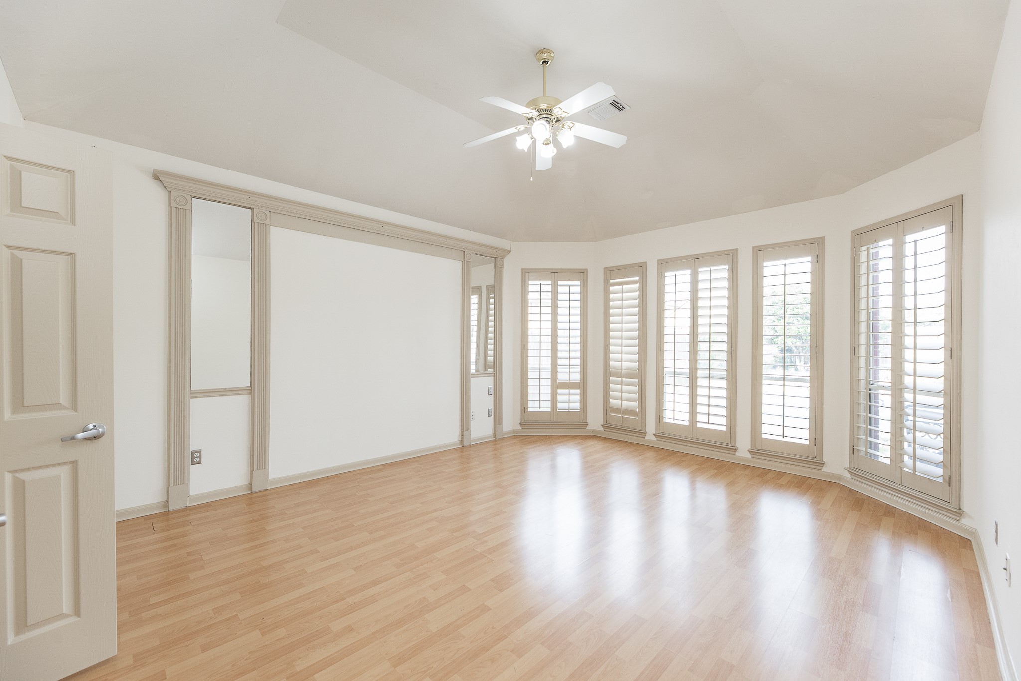 17826 Island Spring Lane Tomball, TX 77377 - Photo 26 of 47 a view of an empty room with wooden floor and a window