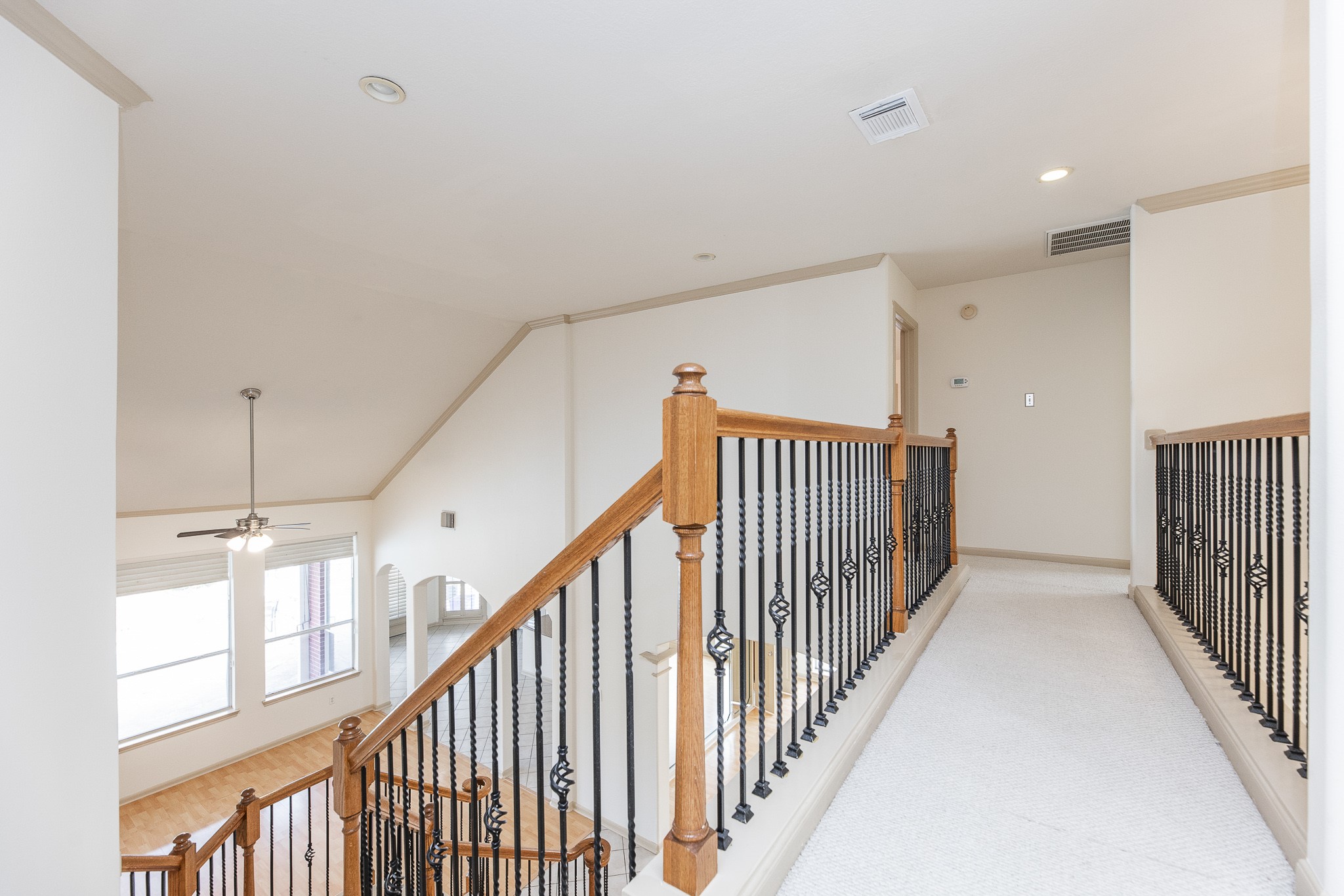 17826 Island Spring Lane Tomball, TX 77377 - Photo 35 of 47 a view of a hallway with stairs