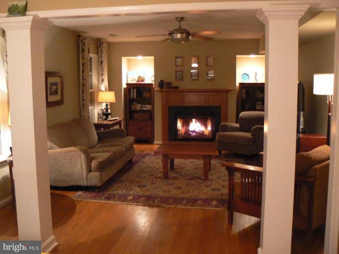 44886 Mallard Place Callaway, MD 20620 - Photo 12 of 30 a living room with furniture and a fireplace