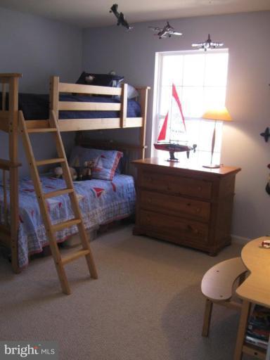 44886 Mallard Place Callaway, MD 20620 - Photo 25 of 30 a bedroom with a bed and a window