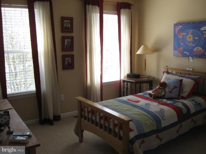 44886 Mallard Place Callaway, MD 20620 - Photo 26 of 30 a bedroom with a bed and a window
