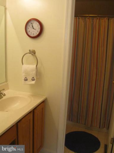 44886 Mallard Place Callaway, MD 20620 - Photo 27 of 30 a bathroom with a sink and a mirror