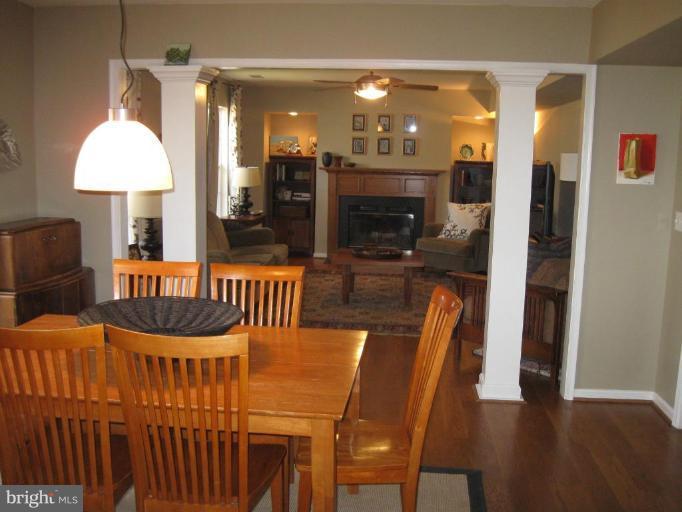 44886 Mallard Place Callaway, MD 20620 - Photo 9 of 30 a view of a dining room with furniture and chandelier