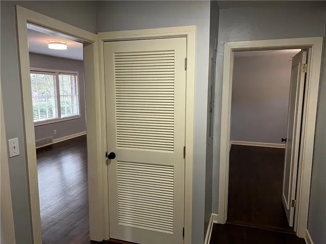 a view of a room that has a window in it