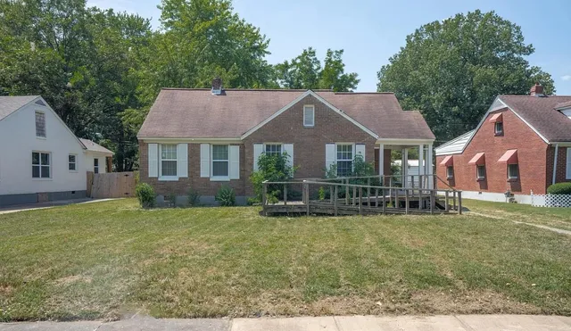 a house that has a lot of trees in it