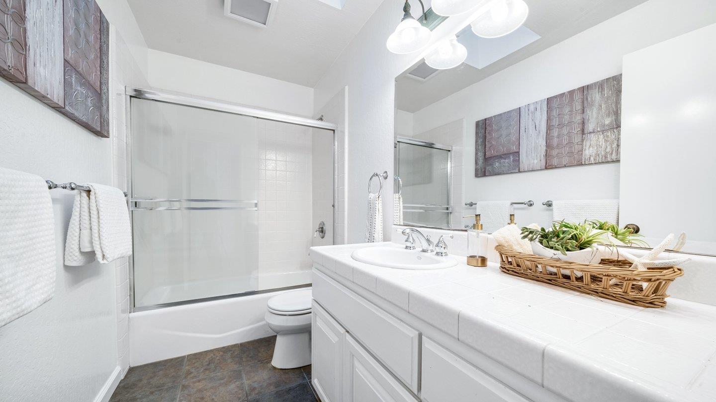 806 Rorke Way Palo Alto, CA 94303 - Photo 13 of 41 a bathroom with a double vanity sink mirror and toilet
