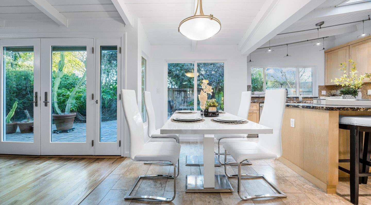 806 Rorke Way Palo Alto, CA 94303 - Photo 18 of 41 a view of a dining room with furniture window and wooden floor