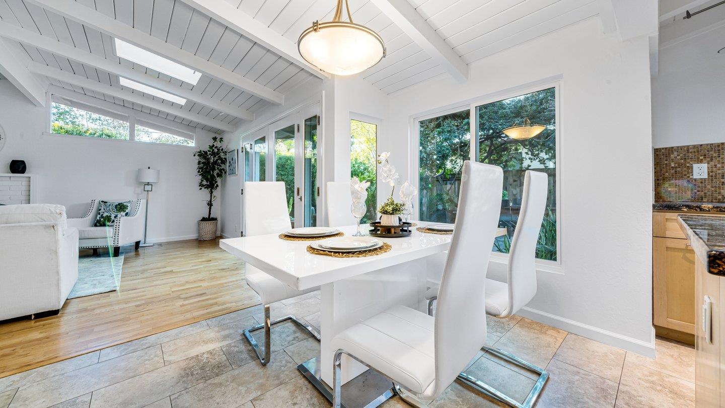 806 Rorke Way Palo Alto, CA 94303 - Photo 19 of 41 a view of a dining room with furniture window and wooden floor