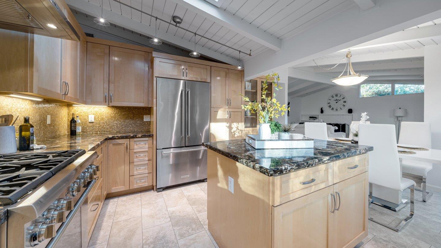 806 Rorke Way Palo Alto, CA 94303 - Photo 21 of 41 a kitchen with stainless steel appliances granite countertop a sink stove and refrigerator