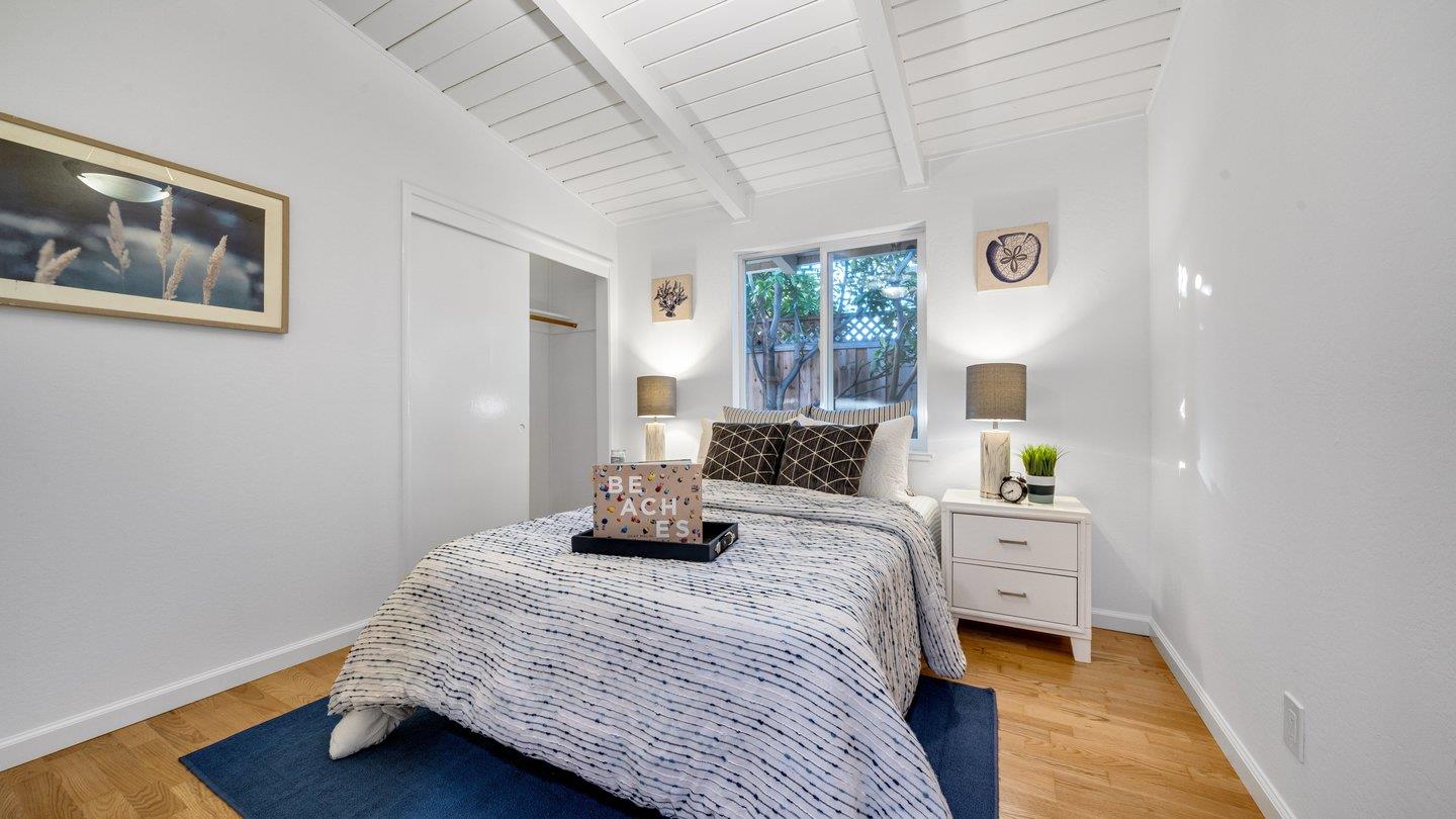 806 Rorke Way Palo Alto, CA 94303 - Photo 24 of 41 a bedroom with a bed and a window