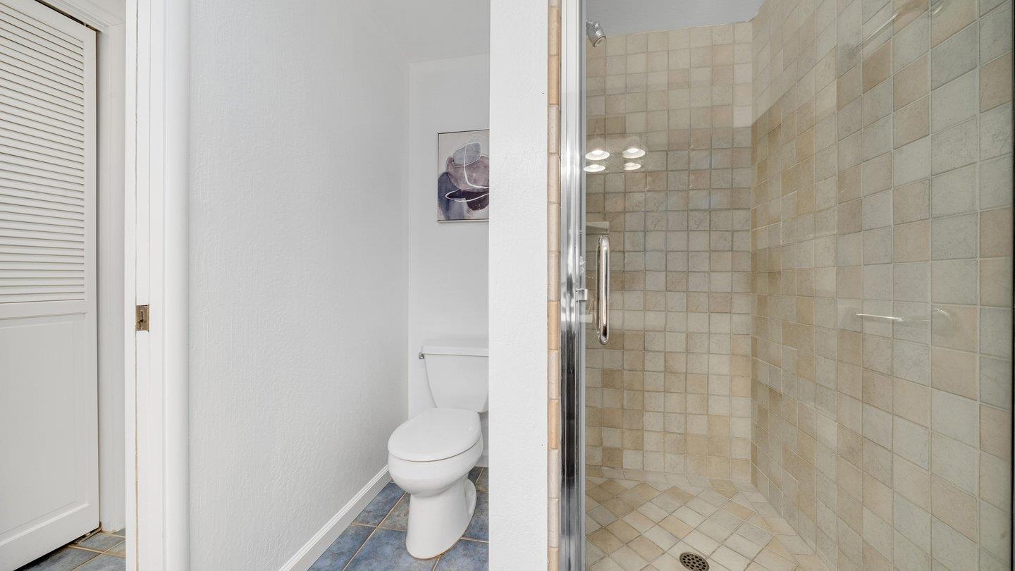 806 Rorke Way Palo Alto, CA 94303 - Photo 35 of 41 a bathroom with a toilet and shower