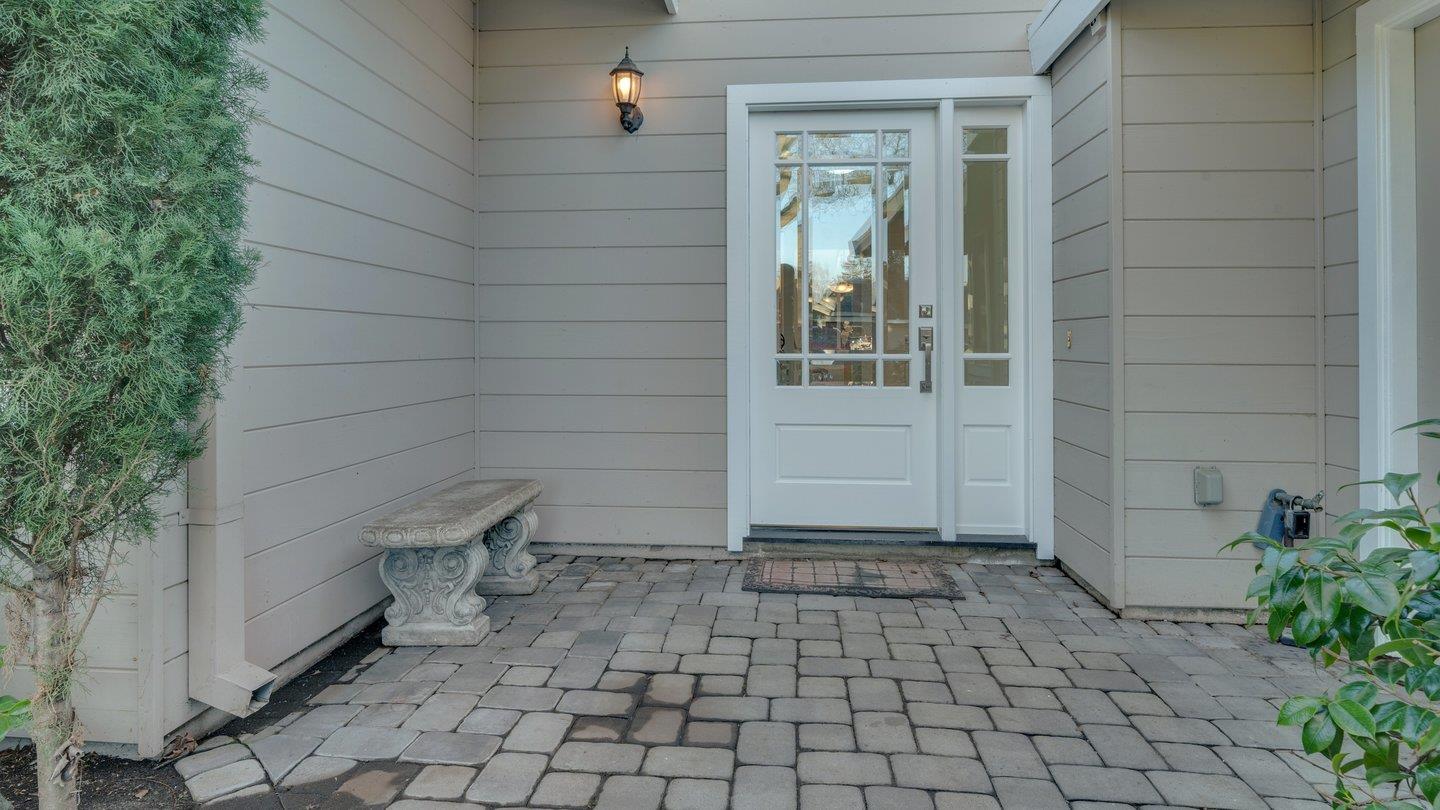 806 Rorke Way Palo Alto, CA 94303 - Photo 4 of 41 a view of a porch with a bench and potted plants