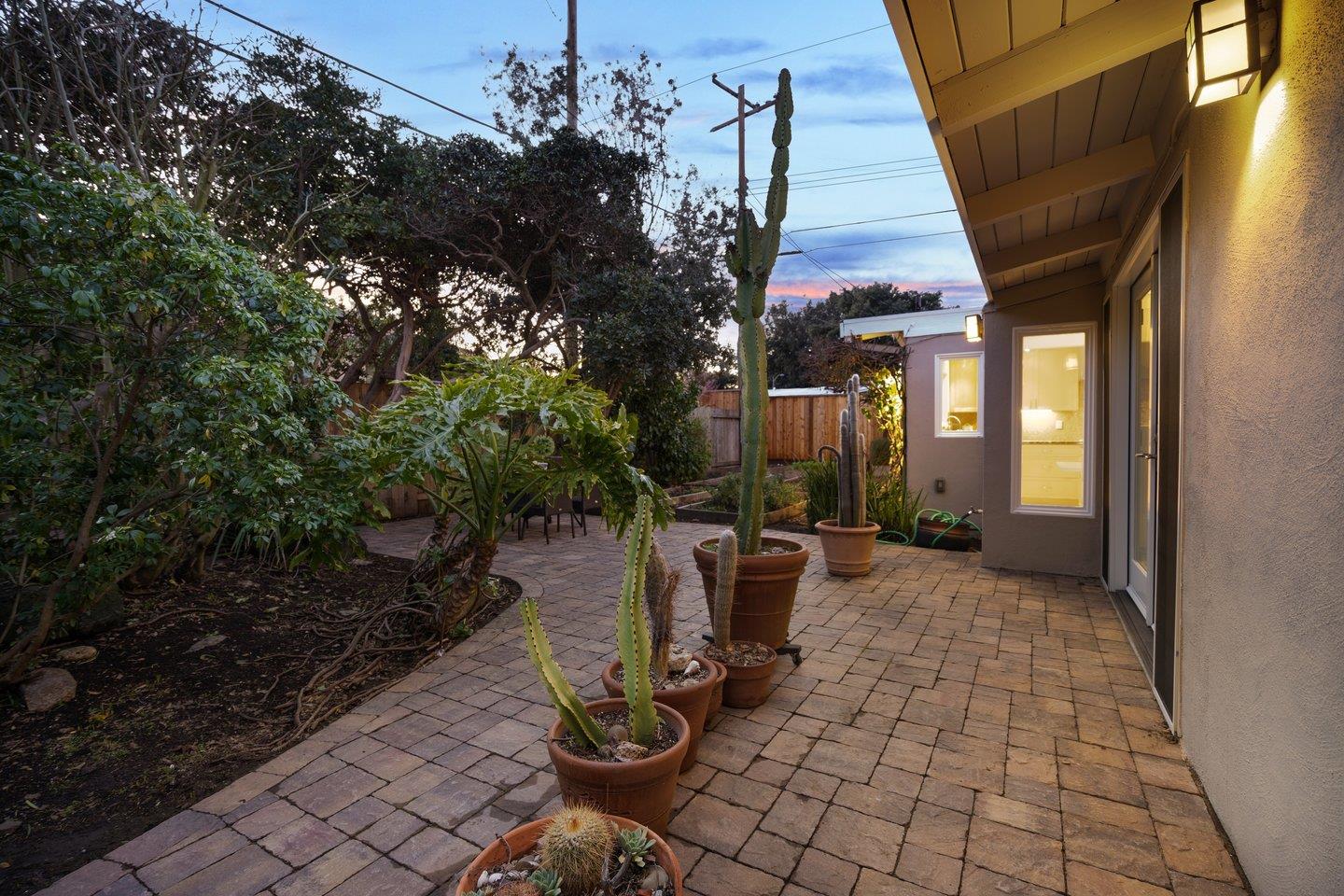 806 Rorke Way Palo Alto, CA 94303 - Photo 41 of 41 a view of a patio with table and chairs and potted plants