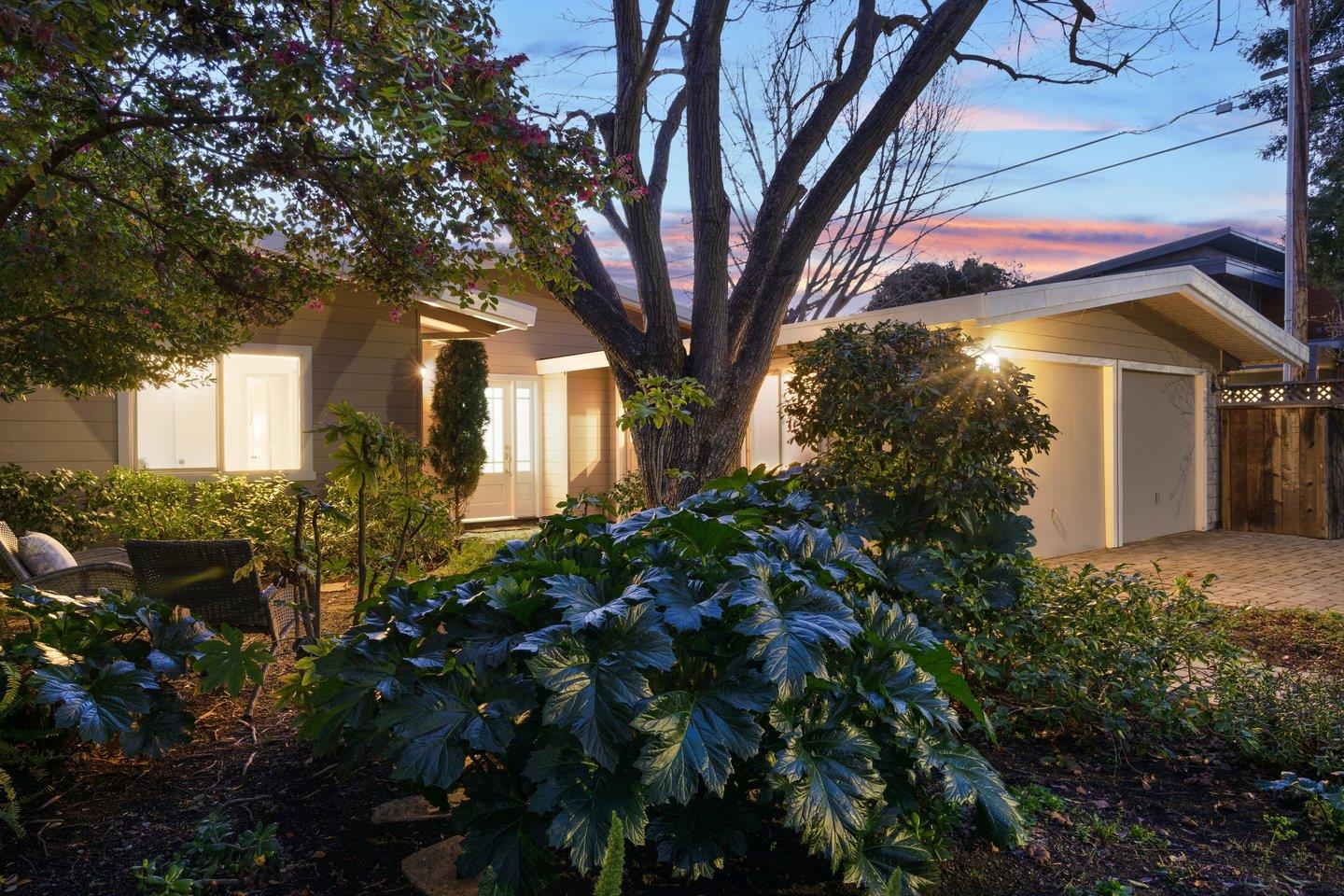 806 Rorke Way Palo Alto, CA 94303 - Photo 7 of 41 a view of a house with a tree and flower plants
