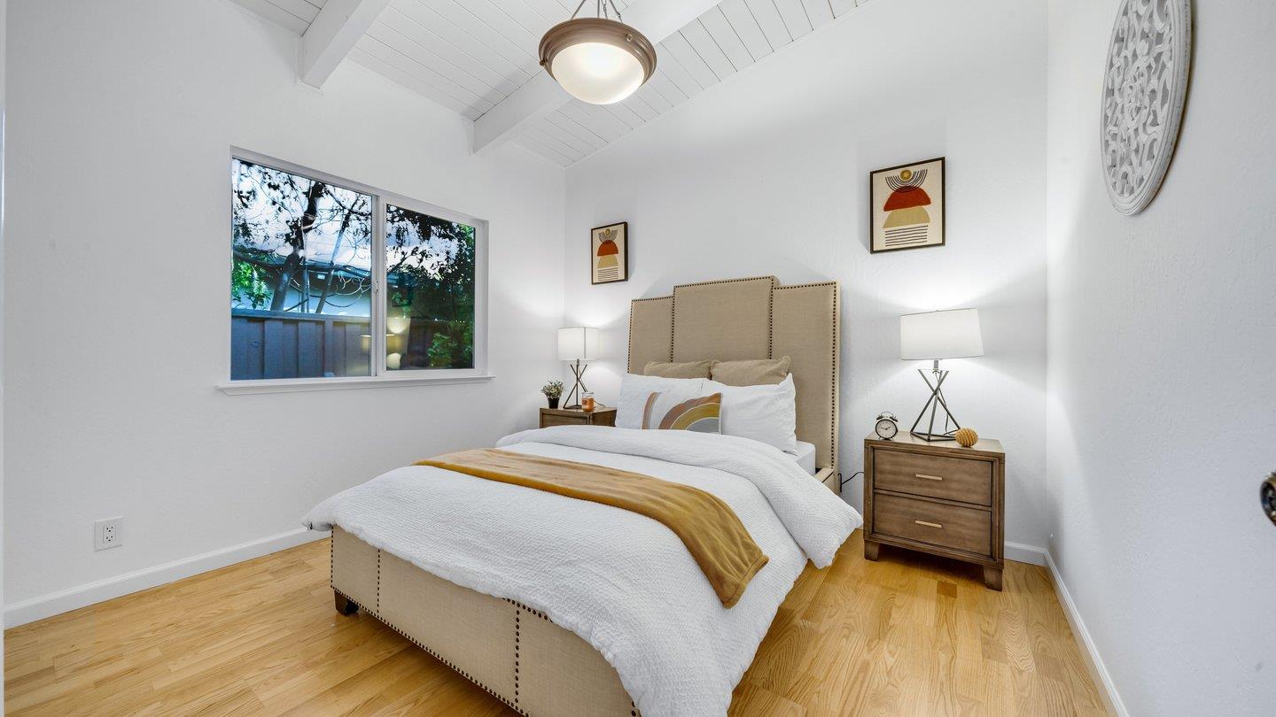 806 Rorke Way Palo Alto, CA 94303 - Photo 9 of 41 a bedroom with a bed and a window