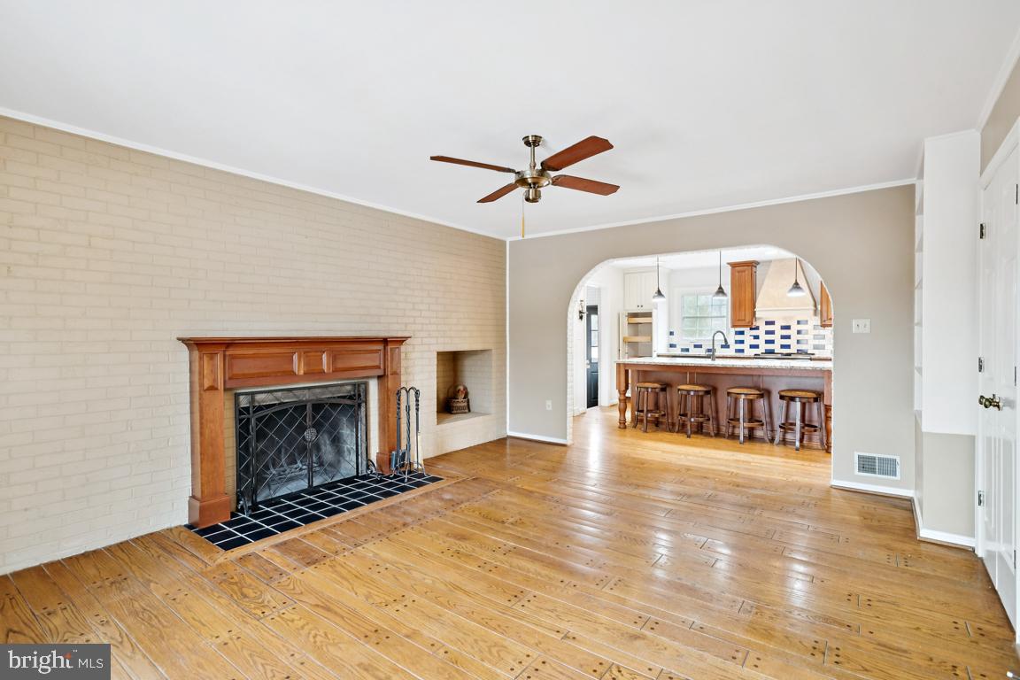 9033 Old Waterloo Road Warrenton, VA 20186 - Photo 12 of 49 Family Room to Kitchen. Gorgeous Cherry Mantle
