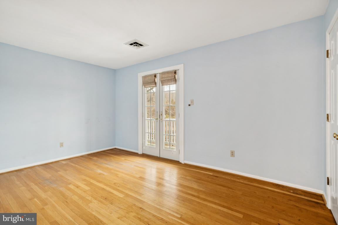 9033 Old Waterloo Road Warrenton, VA 20186 - Photo 22 of 49 Second Bedroom with Fr. Doors to Covered Balcony