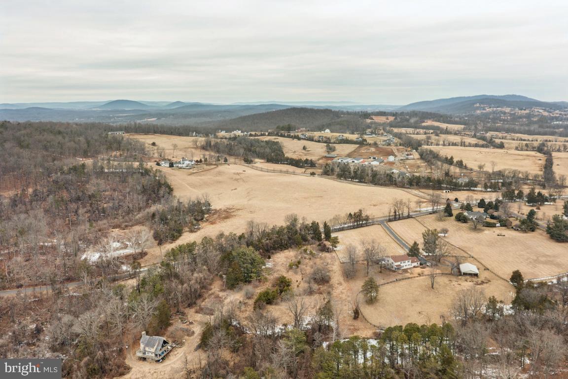 9033 Old Waterloo Road Warrenton, VA 20186 - Photo 41 of 49 Drone View of Neighborhood to Mountains