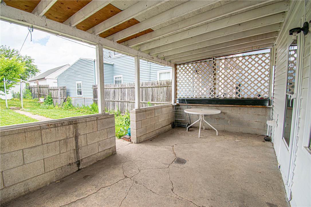 27 West Allen Street Allentown, PA 18102 - Photo 24 of 26 A quaint covered patio offers a sheltered outdoor space with views of the fenced yard.