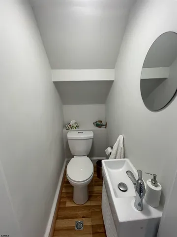 a bathroom with a toilet and a sink