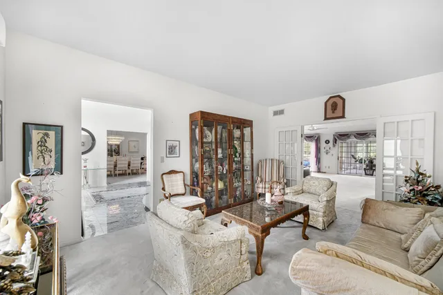 a living room with furniture or couch and a flat screen tv