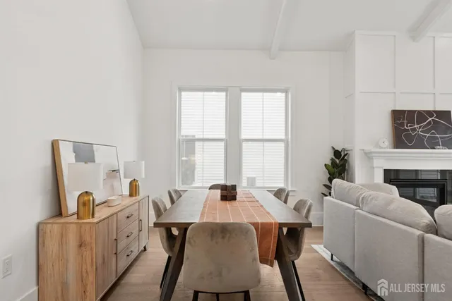 a view of a dining room with furniture window and outside view