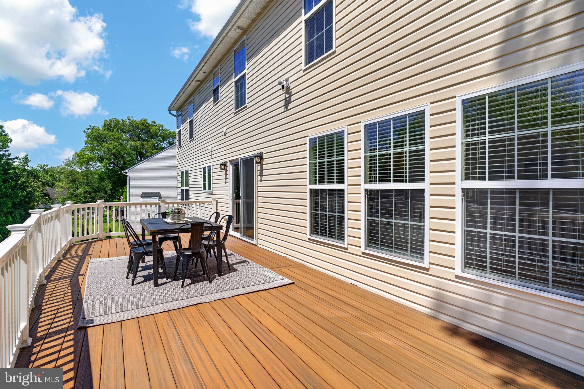 6090 Old Washington Road Elkridge, MD 21075 - Photo 26 of 86 Sunny deck perfect for gatherings.