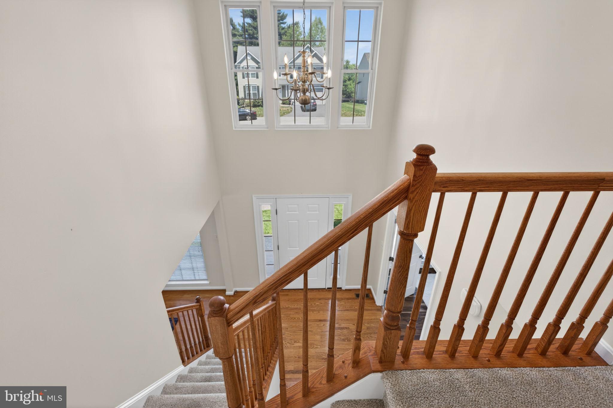 6090 Old Washington Road Elkridge, MD 21075 - Photo 27 of 86 Inviting staircase with natural light.