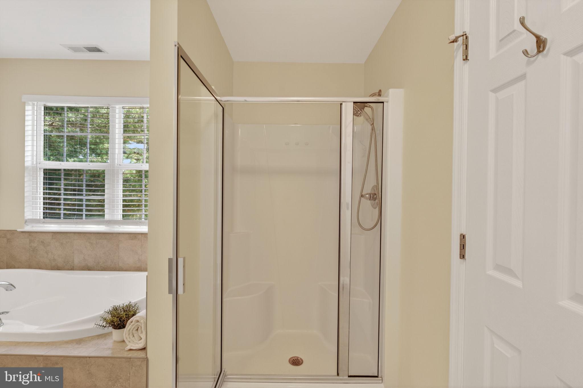 6090 Old Washington Road Elkridge, MD 21075 - Photo 40 of 86 Modern bathroom with sleek shower design.