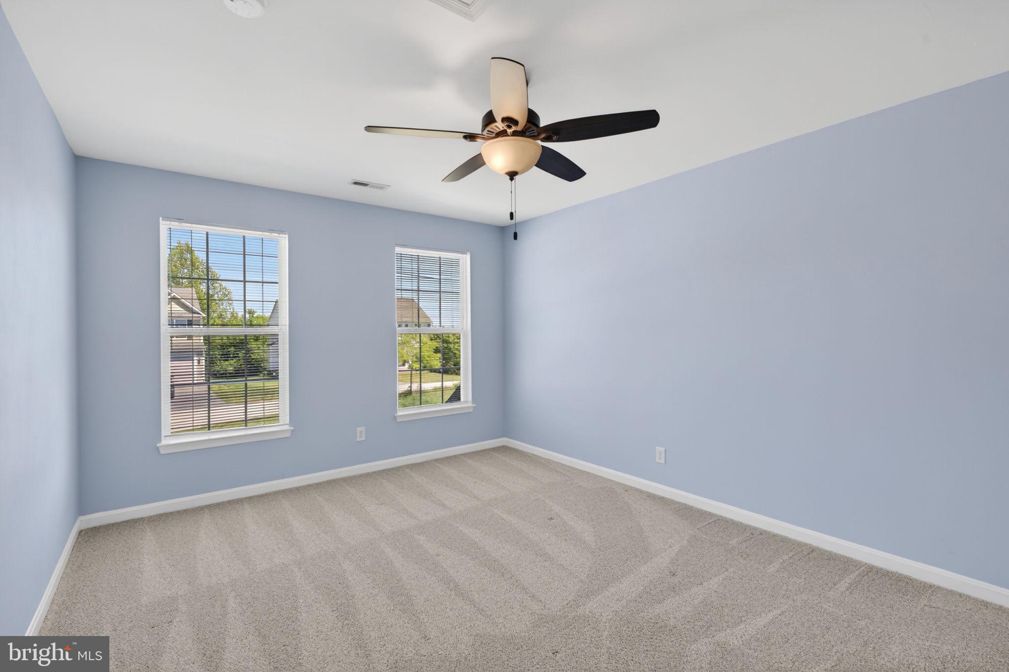 6090 Old Washington Road Elkridge, MD 21075 - Photo 52 of 86 Bright and airy blue bedroom retreat.