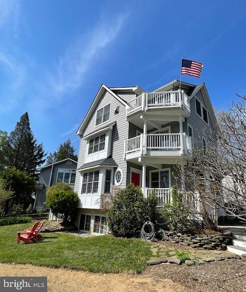 1735 Broadlee Trail Annapolis, MD 21401 - Photo 1 of 65 a front view of a house with a yard