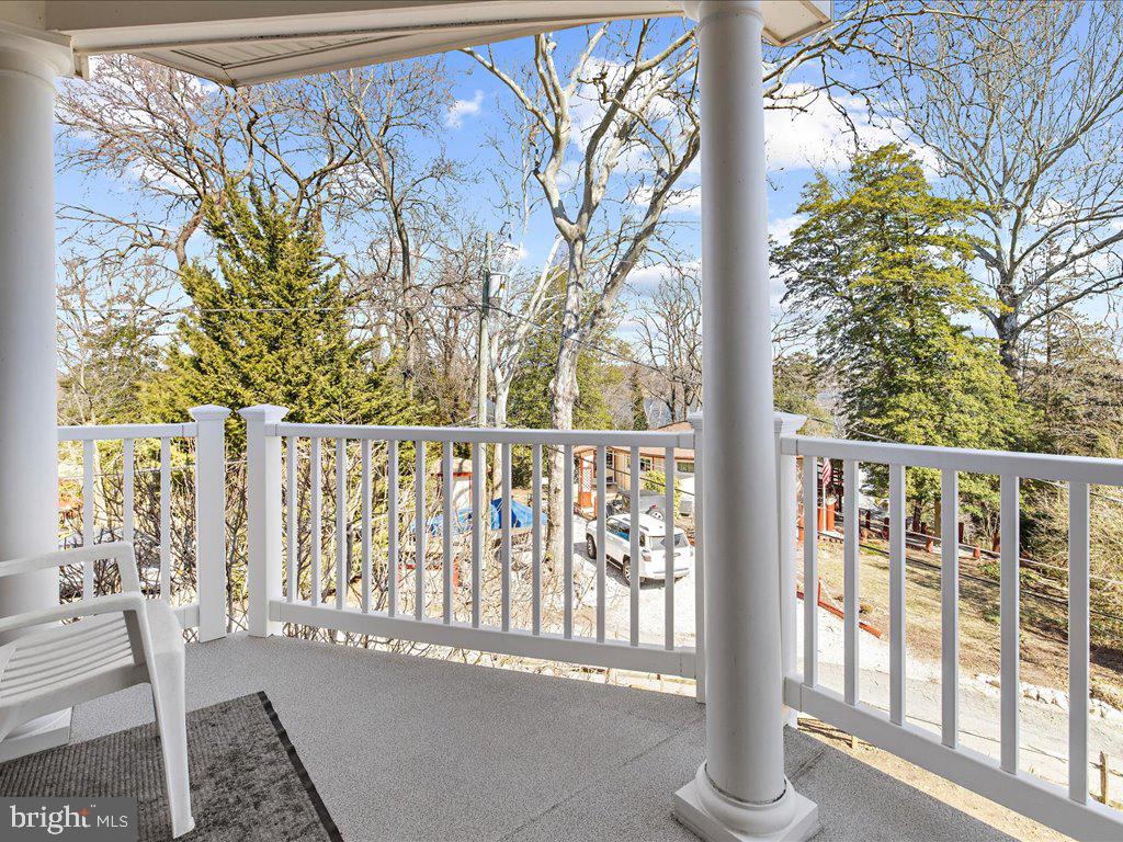 1735 Broadlee Trail Annapolis, MD 21401 - Photo 28 of 65 a view of a balcony with wooden floor