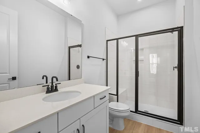 a view of a hallway with stairs