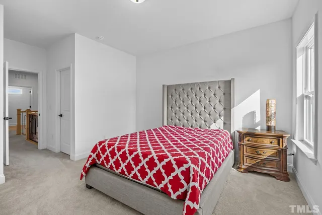 a bathroom with a bathtub and a toilet