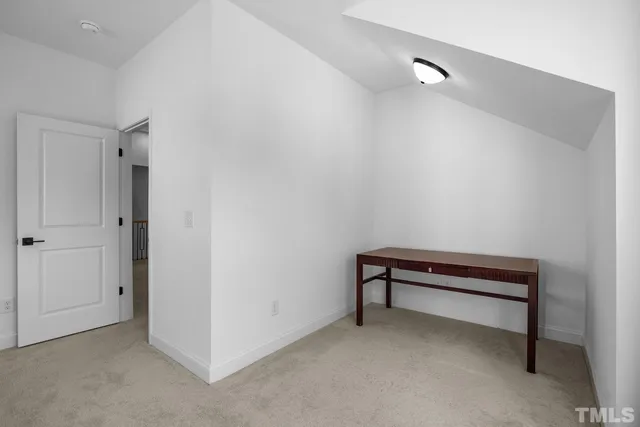 a view of a wooden deck with lake view