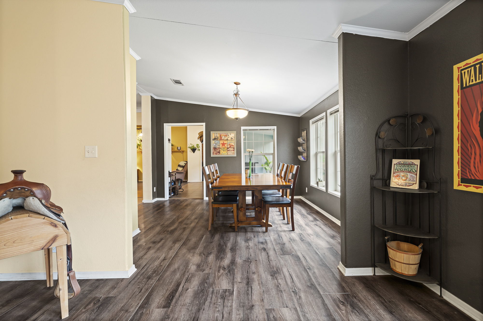175 Fawn Ridge Road Cedar Creek, TX 78612 - Photo 12 of 34 a view of a dining room with furniture window and wooden floor