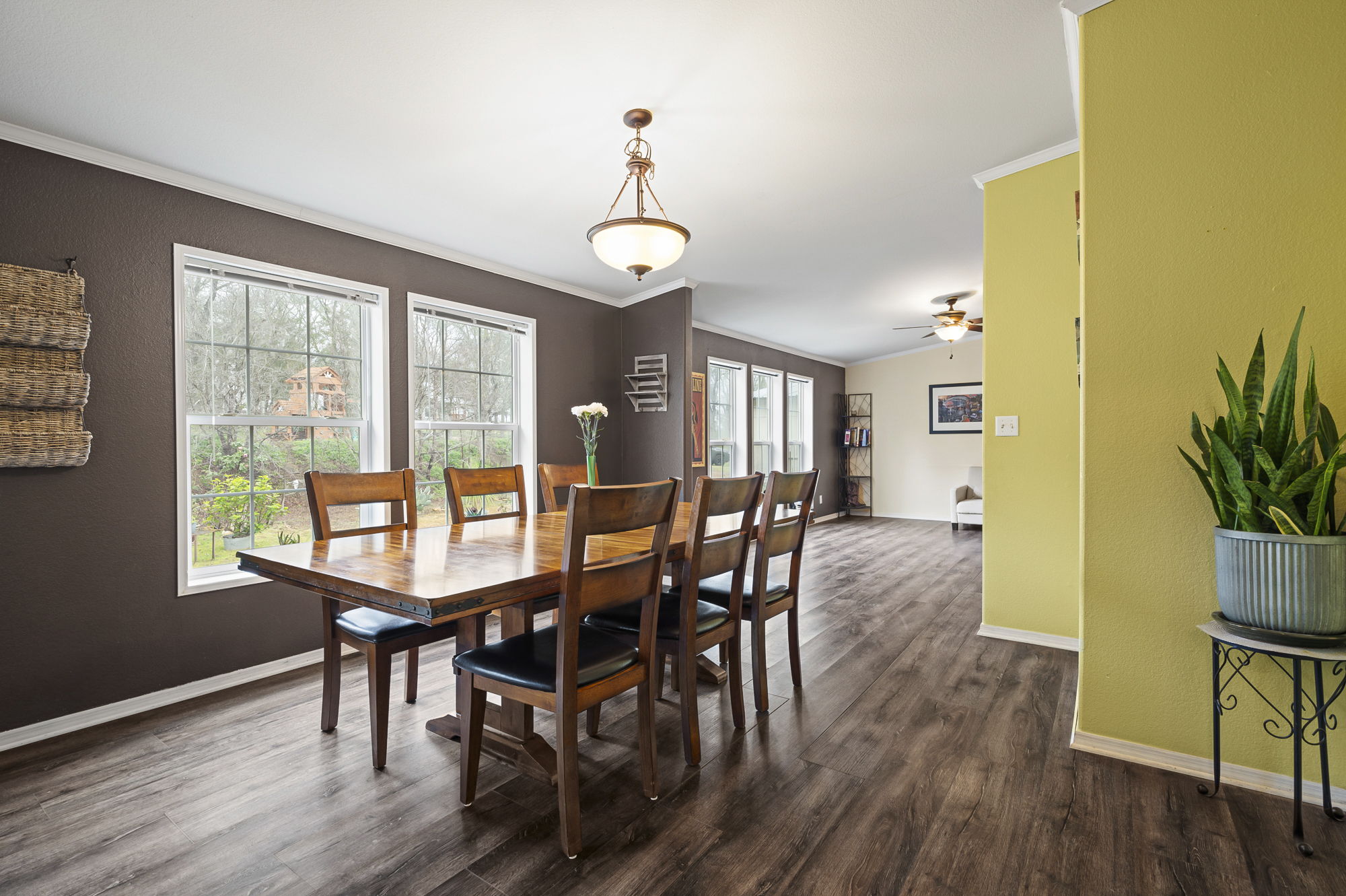 175 Fawn Ridge Road Cedar Creek, TX 78612 - Photo 13 of 34 a view of a dining room with furniture window and wooden floor