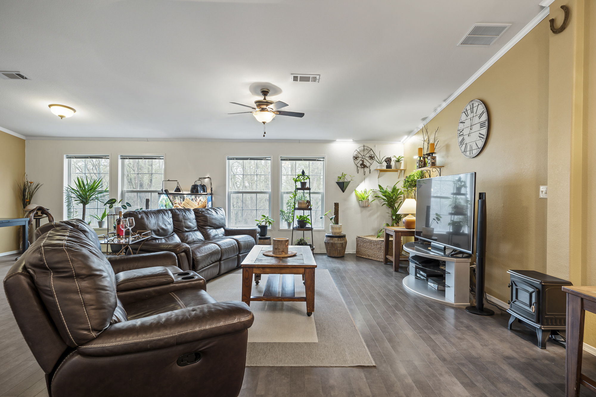 175 Fawn Ridge Road Cedar Creek, TX 78612 - Photo 14 of 34 a living room with furniture kitchen view and a large window