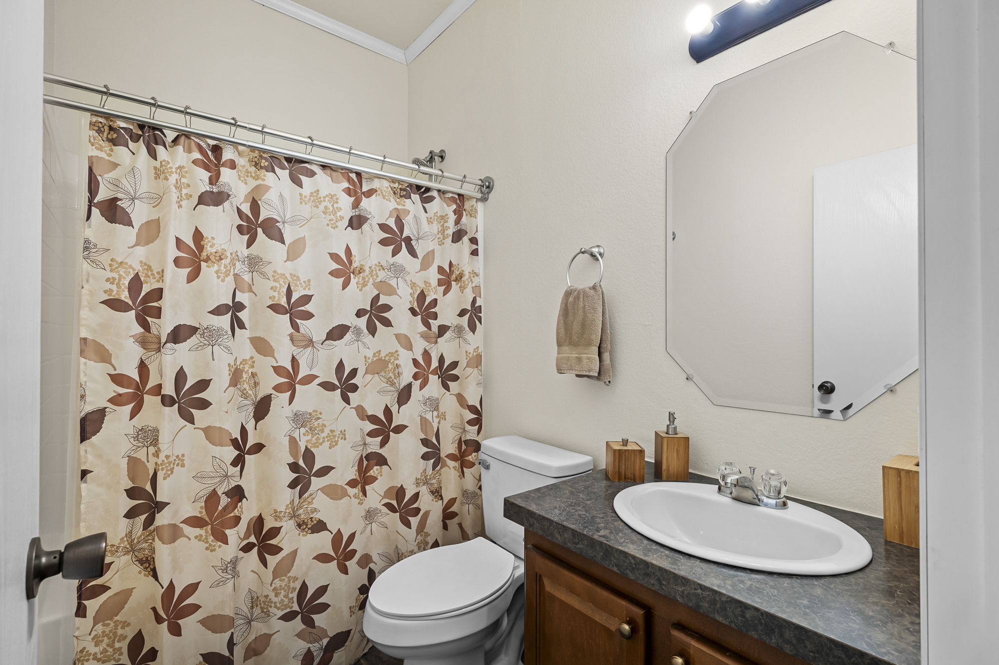 175 Fawn Ridge Road Cedar Creek, TX 78612 - Photo 21 of 34 a bathroom with a sink and a mirror