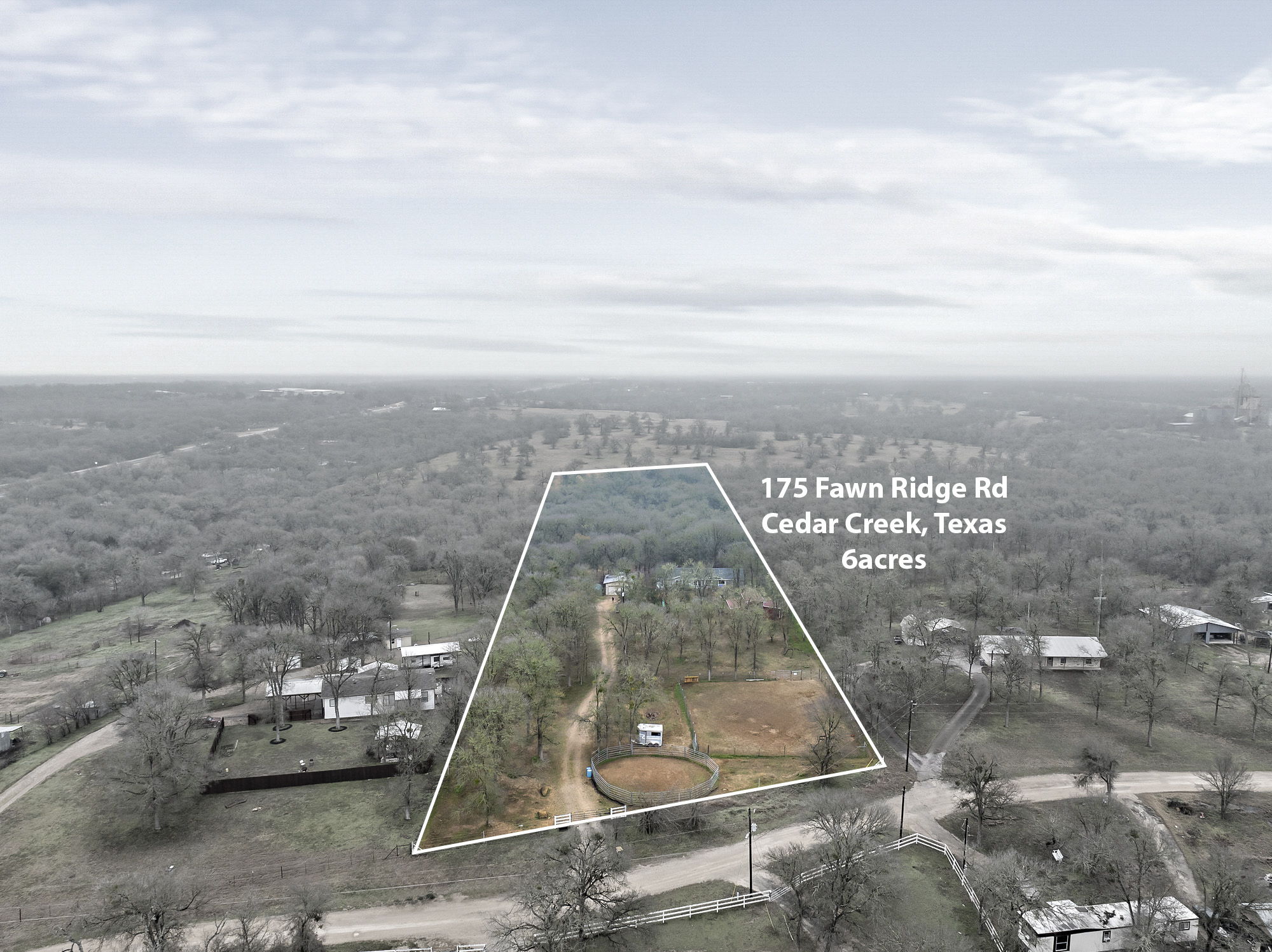 175 Fawn Ridge Road Cedar Creek, TX 78612 - Photo 4 of 34 an aerial view of a house