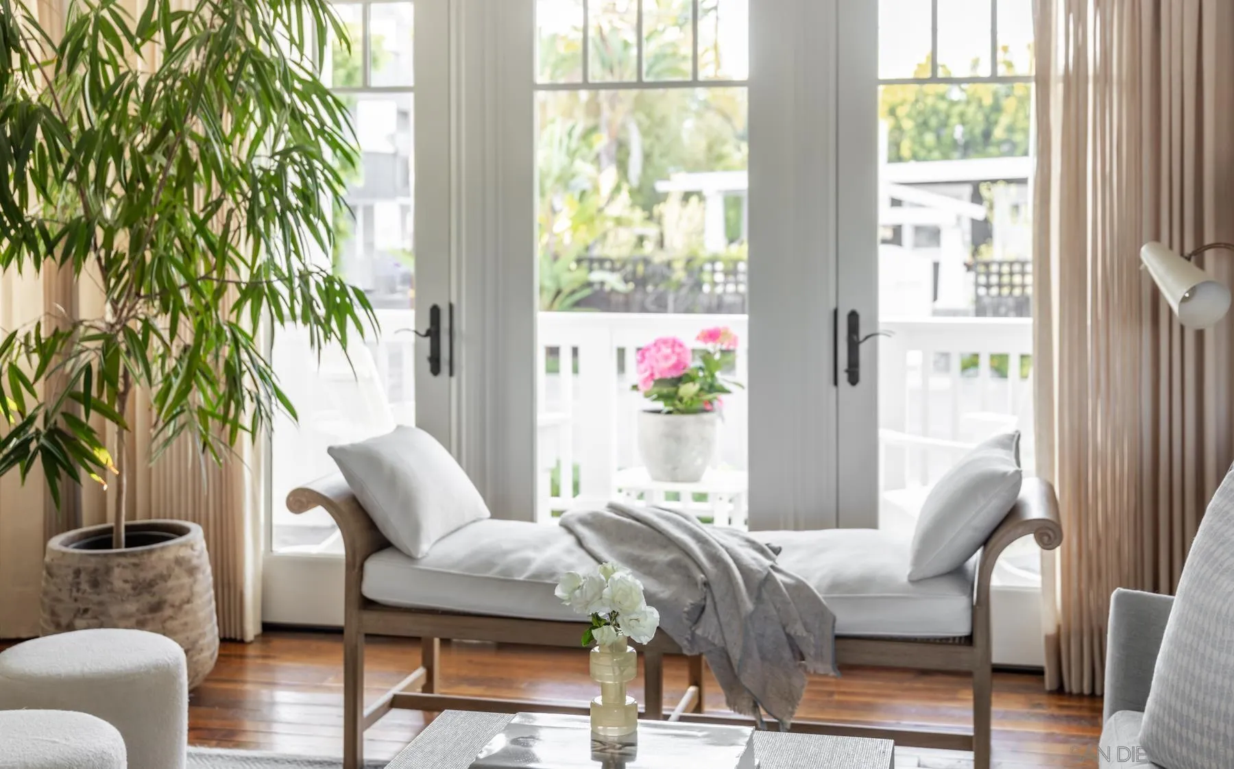 219 27th Street Del Mar, CA 92014 - Photo 13 of 47 a living room with furniture and a potted plant