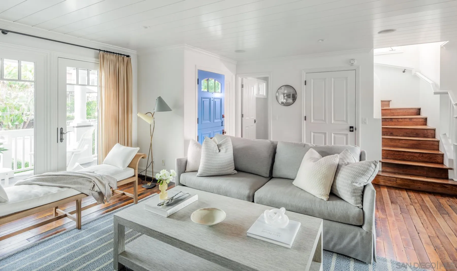 219 27th Street Del Mar, CA 92014 - Photo 14 of 47 a living room with furniture and wooden floor