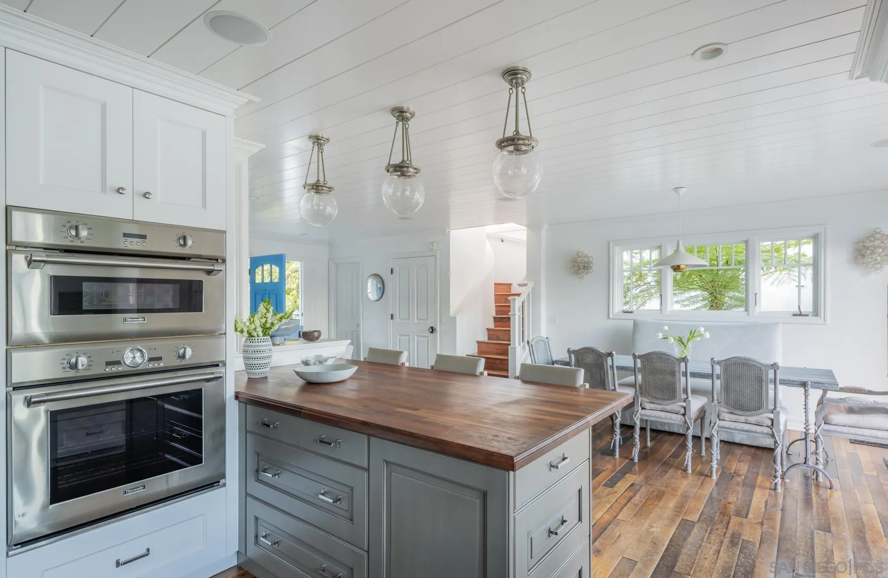 219 27th Street Del Mar, CA 92014 - Photo 23 of 47 a kitchen with a stove and a wooden floor