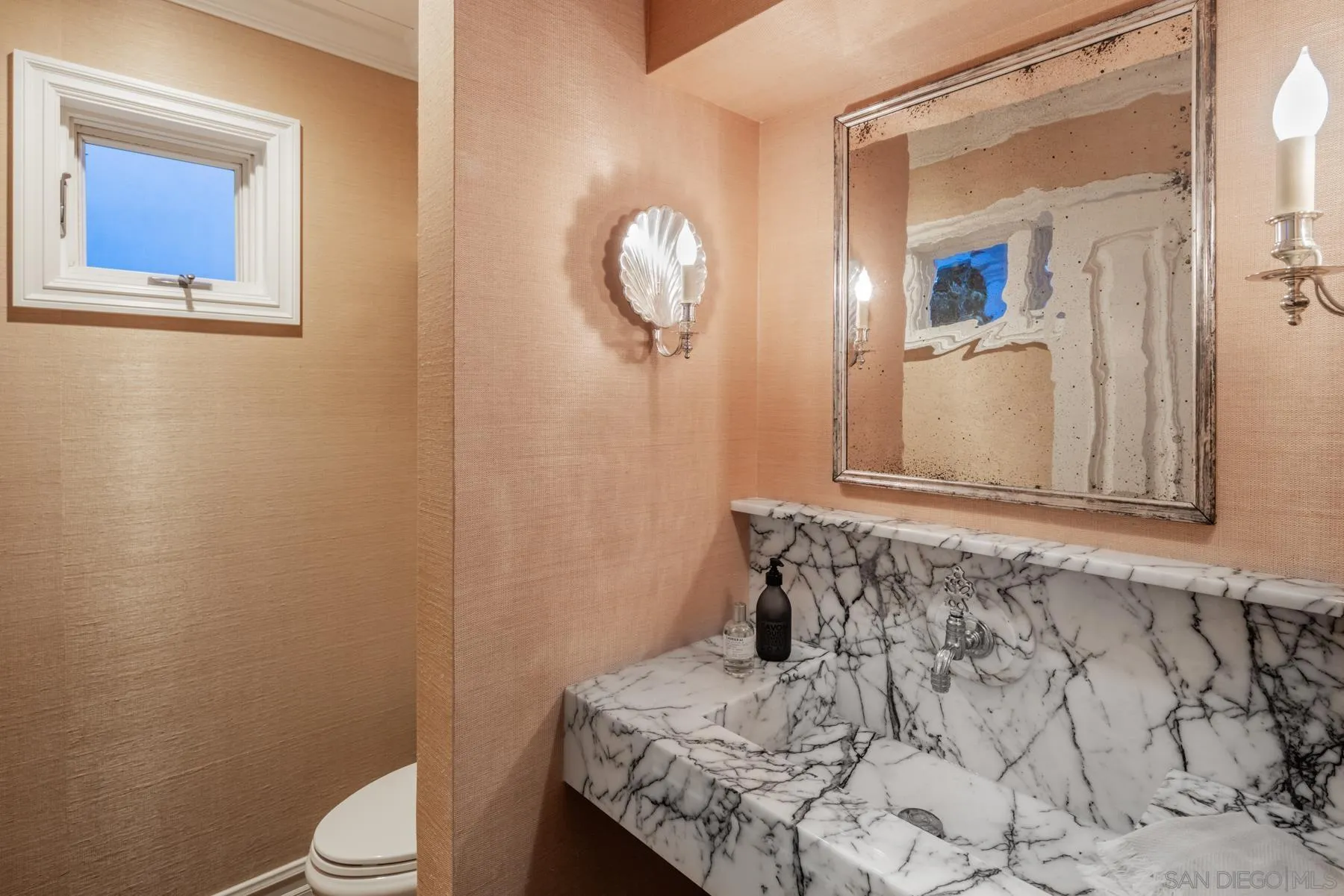 219 27th Street Del Mar, CA 92014 - Photo 27 of 47 a bathroom with a granite countertop sink and a mirror