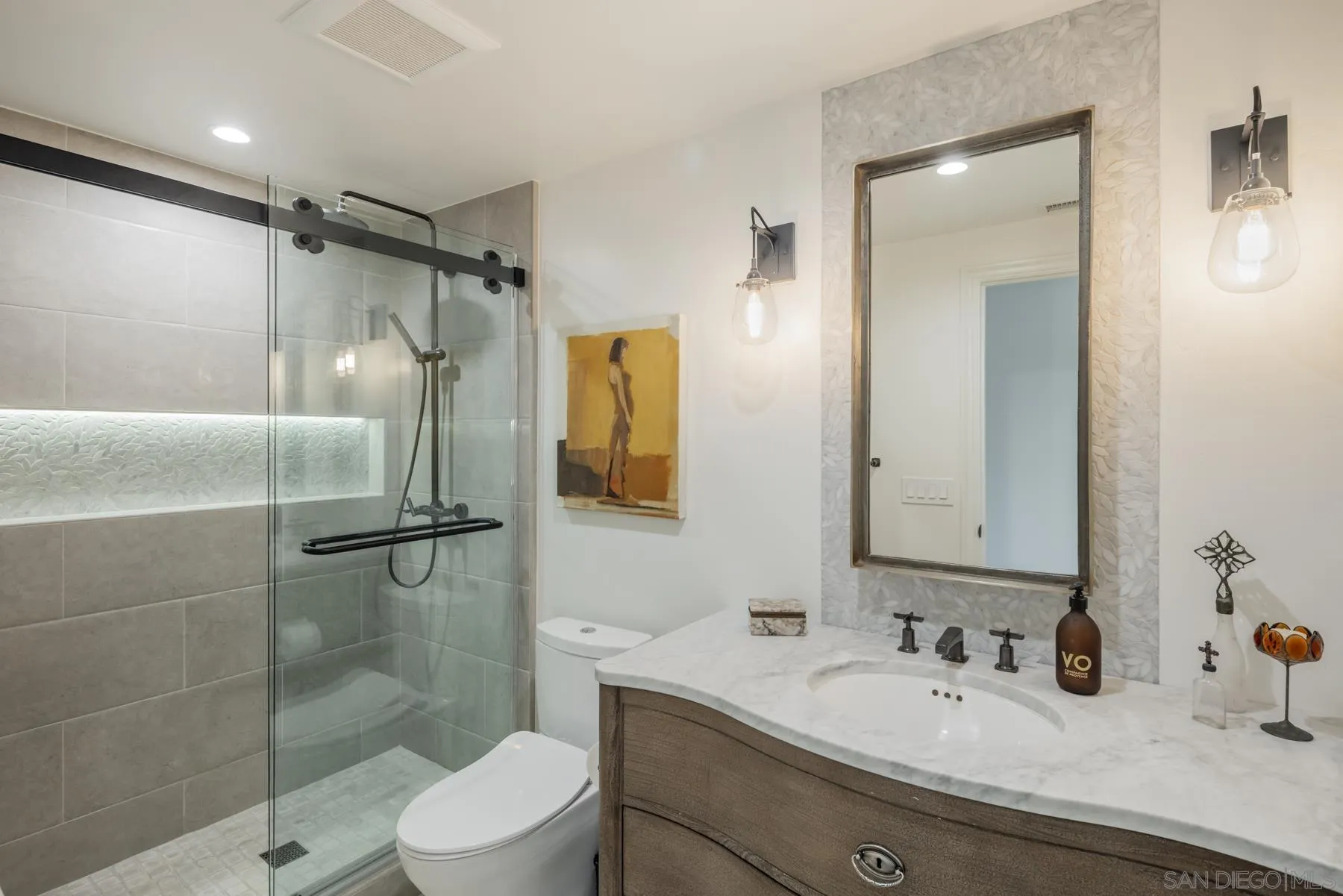 219 27th Street Del Mar, CA 92014 - Photo 40 of 47 a bathroom with a sink toilet and shower