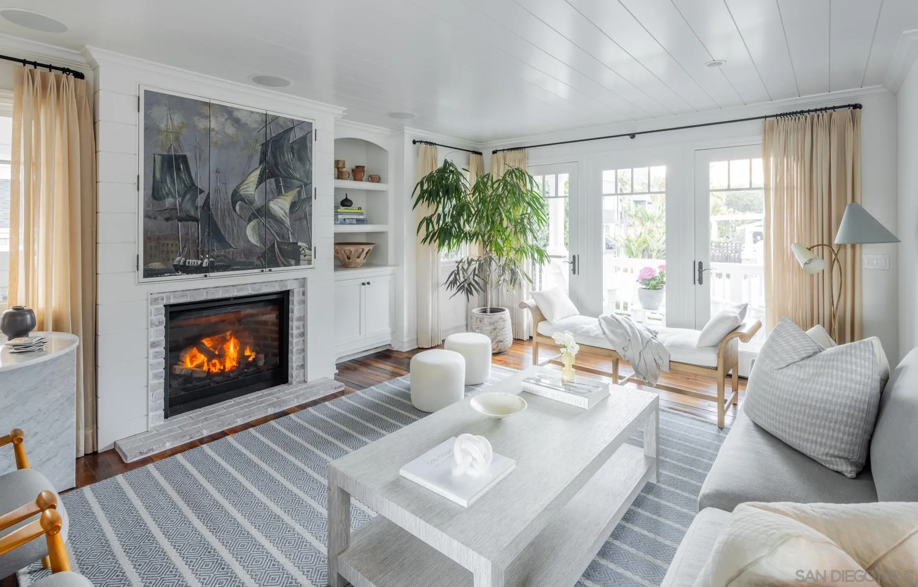 219 27th Street Del Mar, CA 92014 - Photo 10 of 47 a living room with furniture and a fireplace