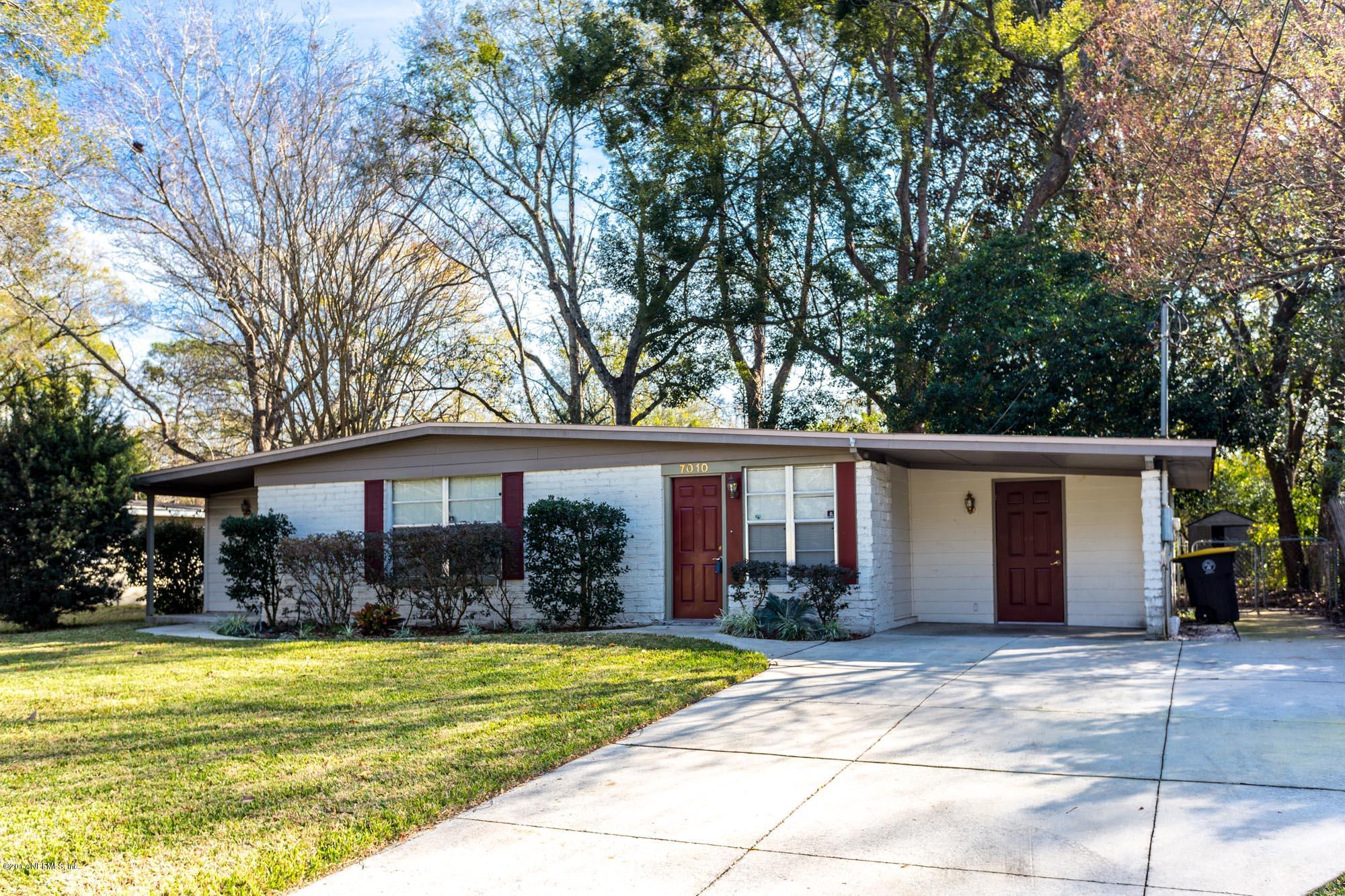 7010 Arques Road Jacksonville, FL 32205 - Photo 1 of 16 a view of house with yard and outdoor space