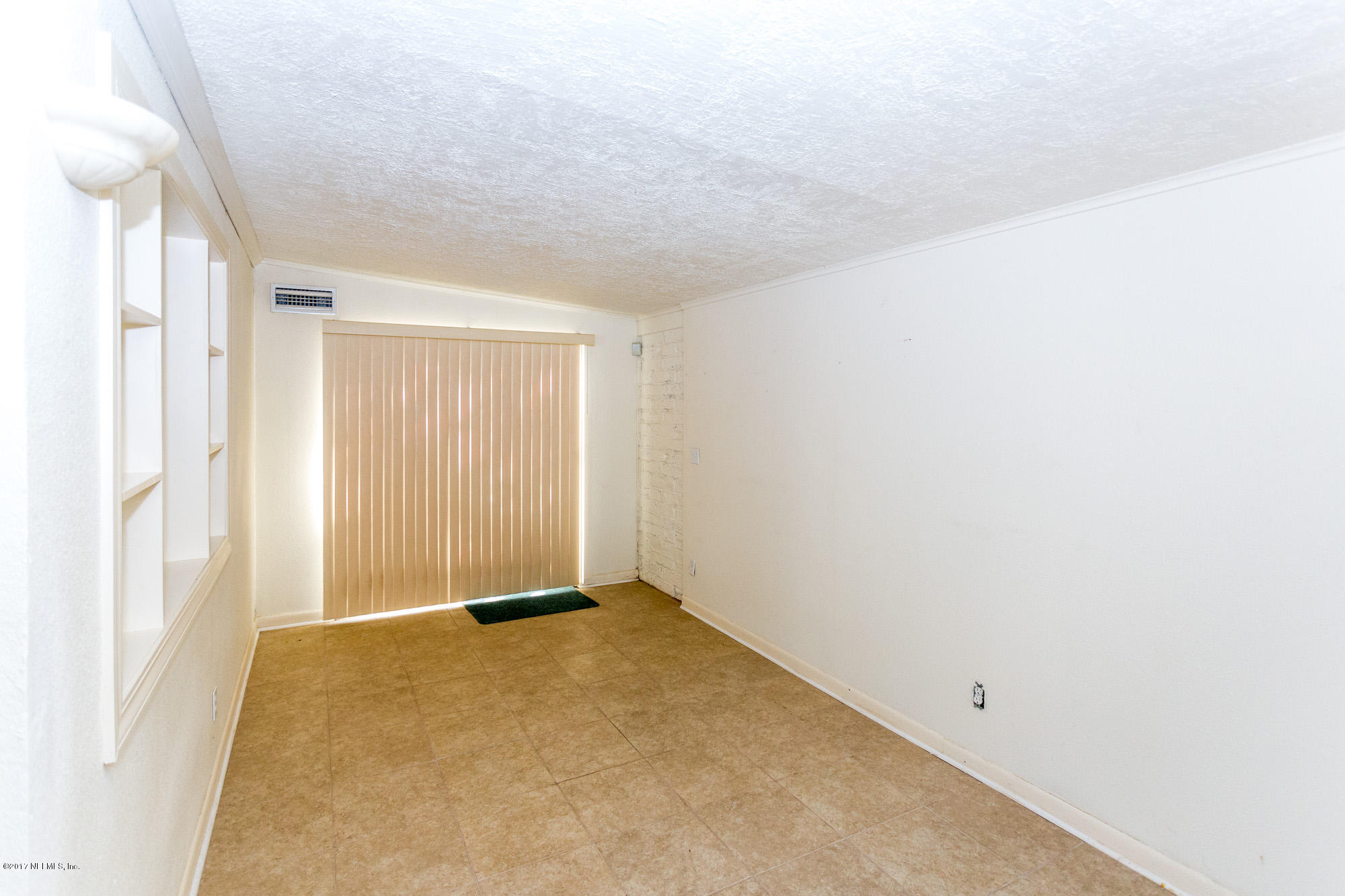 7010 Arques Road Jacksonville, FL 32205 - Photo 4 of 16 a view of an empty room
