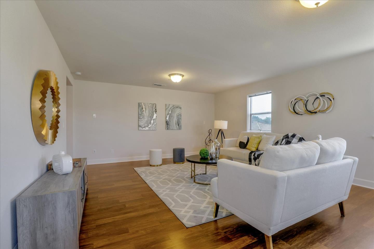 1081 Cabrillo Drive Hollister, CA 95023 - Photo 13 of 60 a living room with furniture and window